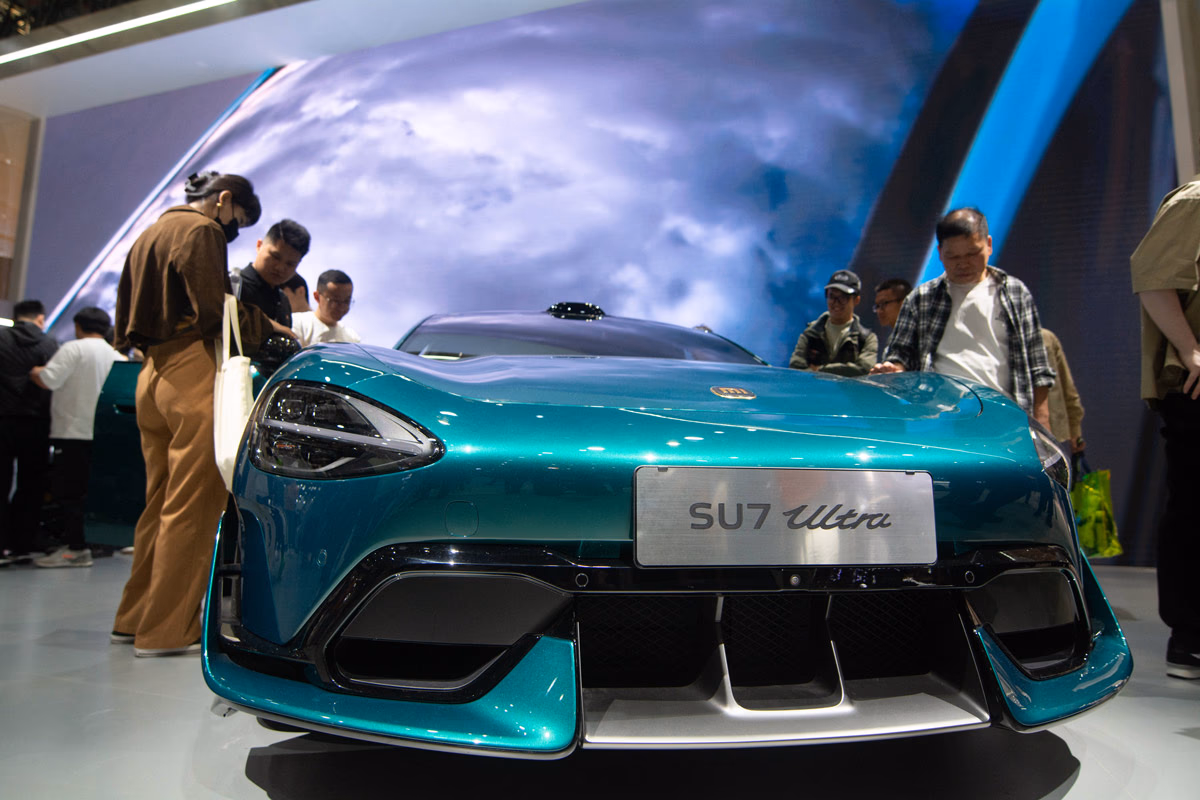 Auf der Autmobilmesse in Peking. Es sind Technologiekonzerne wie Xiaomi, die als neue Player in das Geschäft mit E-Fahrzeugen einsteigen.